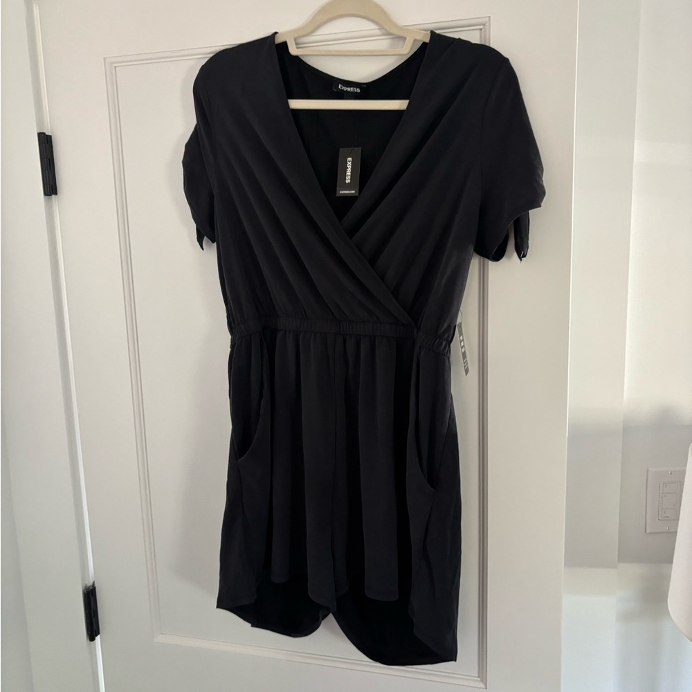 Express Charcoal Romper. Size Large. Had pockets